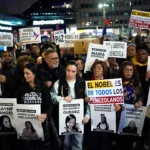 Pendukung Machado dari Venezuela menggelar aksi unjuk rasa di berbagai kota di seluruh dunia.