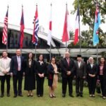 Menyambut anggota keluarga baru: Bendera Indonesia dikibarkan di Kantor Regional WHO untuk Wilayah Pasifik Barat.